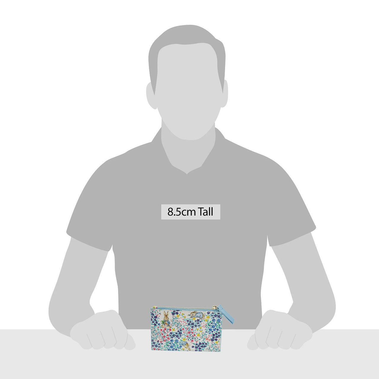 Beatrix Potter Peter Rabbit Garden Party Pop Up Purse This beautiful Peter Rabbit Garden Party Pop Up Purse features a new design with 4 card holders and a zip top to keep all your loose change.