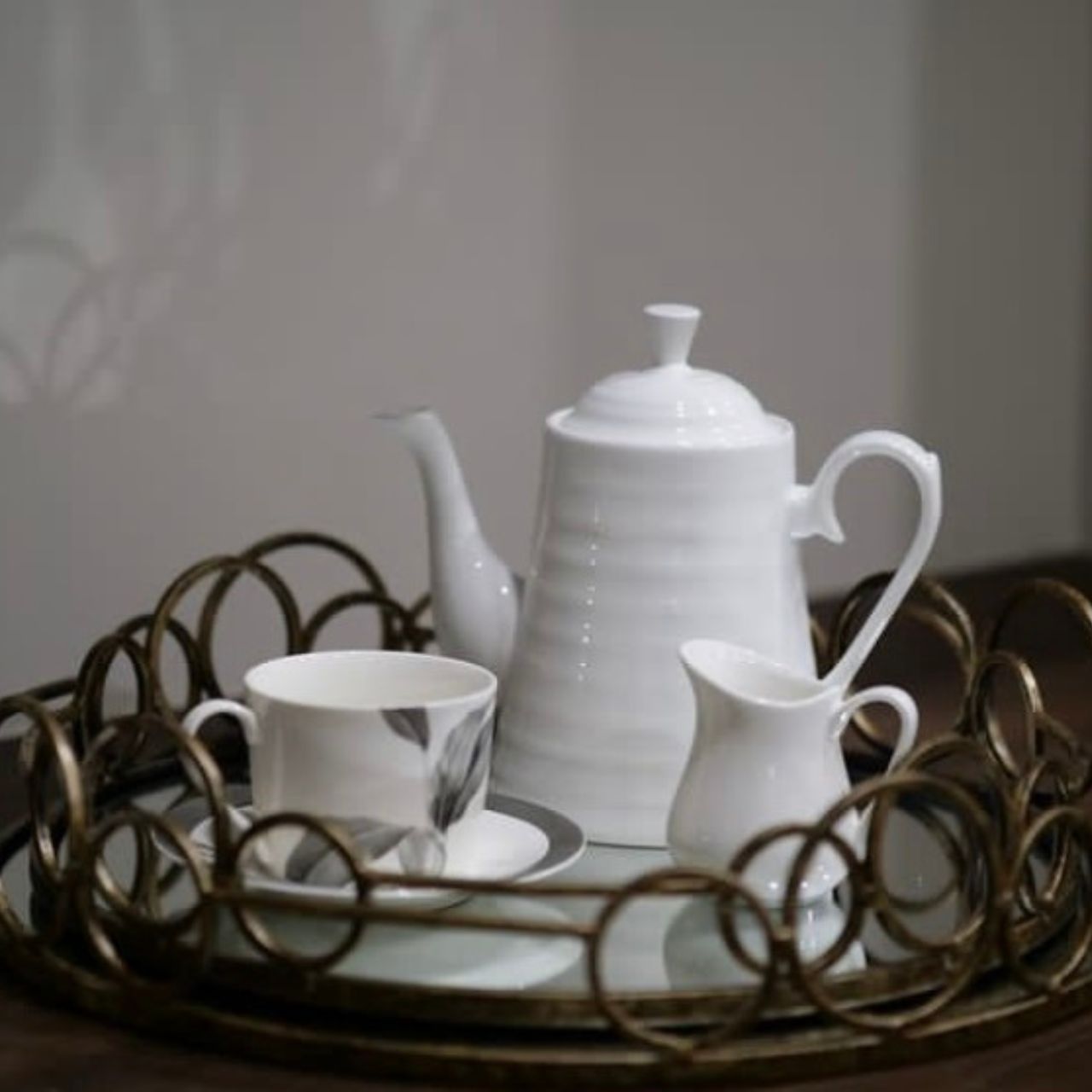 Mindy Brownes Remy Trays Set of 2 Set of two mirrored trays, Serve your drinks or nibbles in style on this deco mirror tray. Beautifully constructed from glass and metal, it's sure to make an impact. Antique gold in finish.