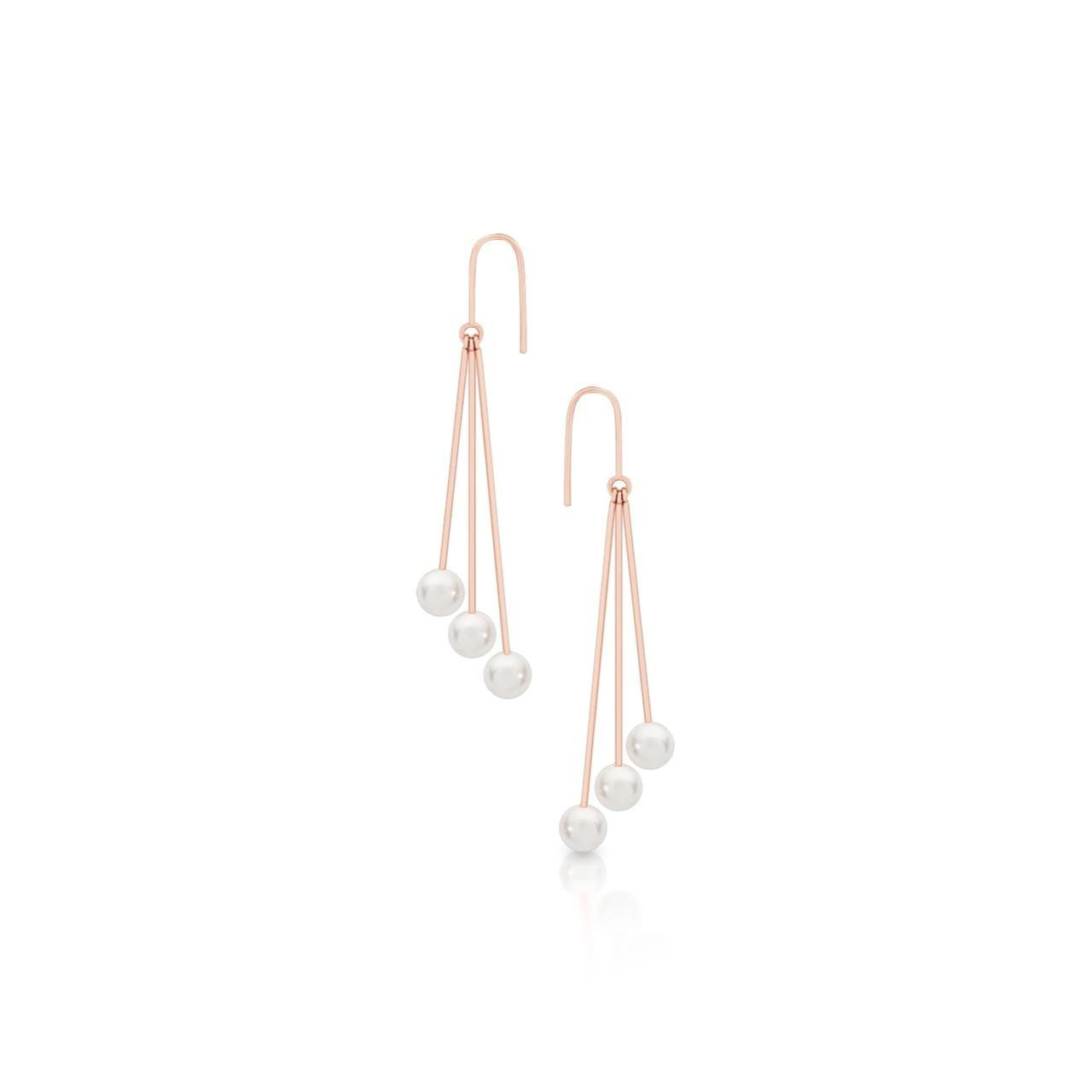 Romi Dublin Rose Gold Pearl Star Burst Earrings The classics are what draw us back time and time again and nothing is more classic than Pearls. We were inspired with this collection to bring a modern twist to a timeless classic.