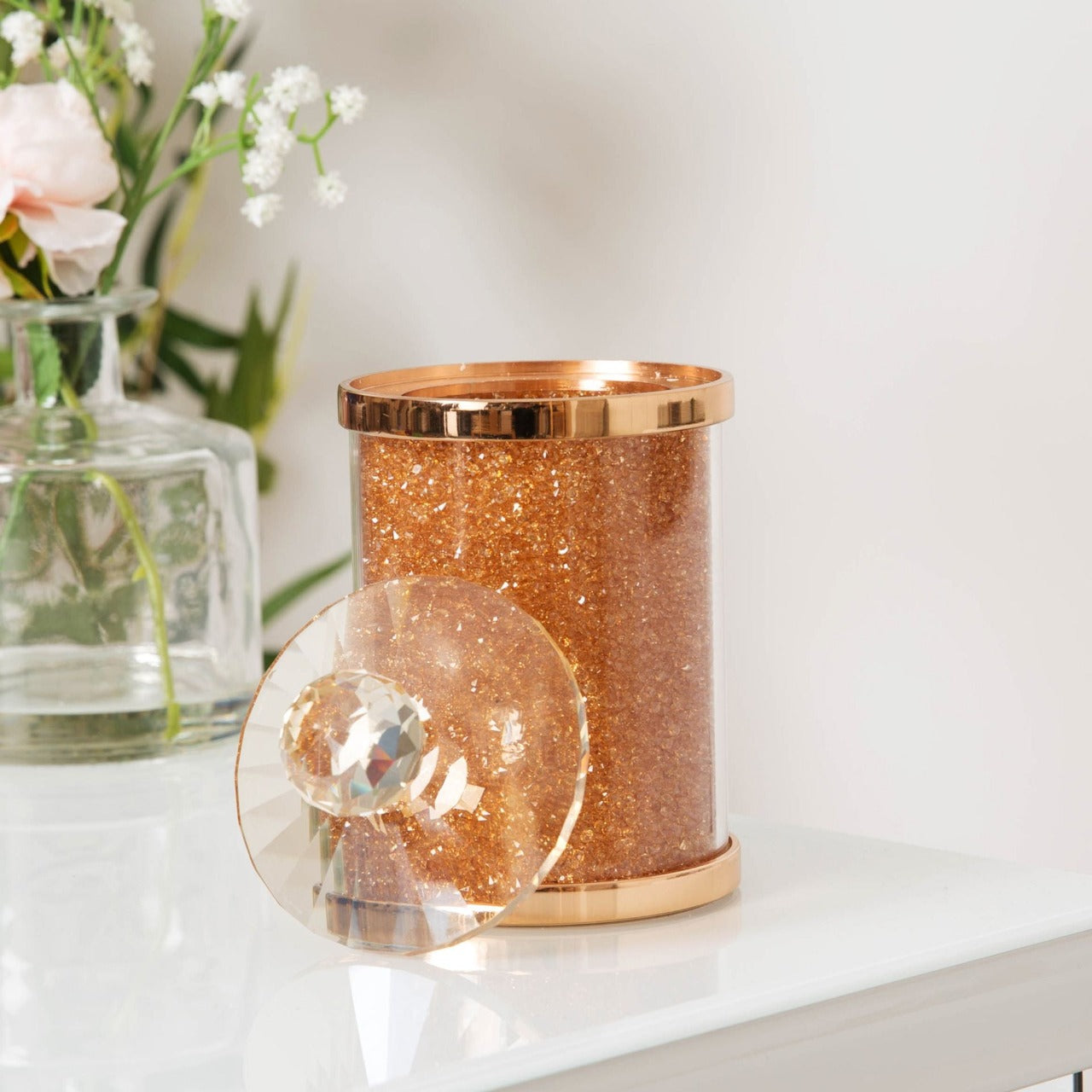 Estella Rose Gold Glass & Crystal Trinket Box  Store those bits and bobs, jewellery or keepsakes in style with this rose gold metal, champagne glass and amber crystal trinket box. From Estella by SOPHIA® - Champagne Chic women's home and gift evoking the luxurious spirit of the art deco era.