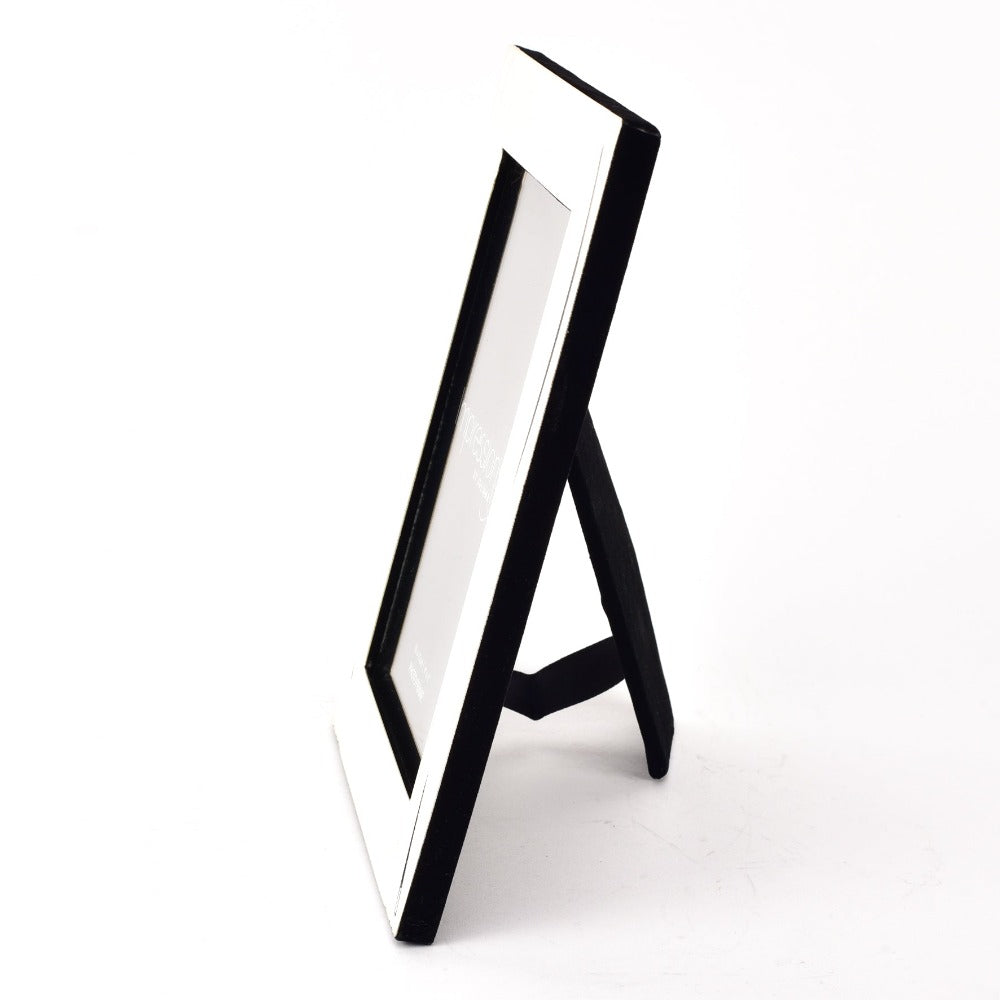 Satin Silver-Plated Photo Frame Shiny Wavy Design 4" x 6" Preserve a special moment with this beautiful silver-plated photo frame. Complete with a shiny wave design and a satin finish, this accessory adds a subtle touch of glamour to any spac