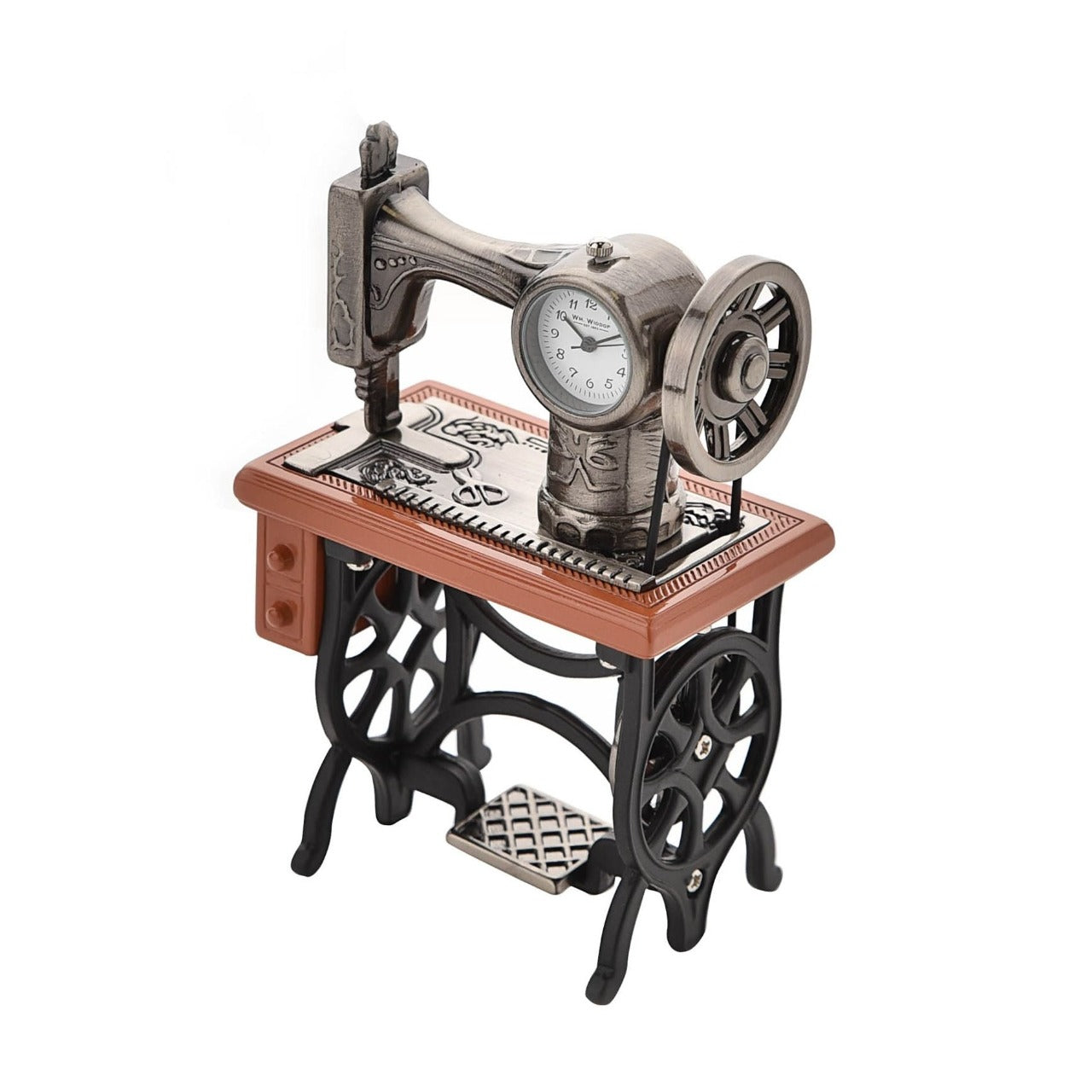 Miniature Clock - Sewing Machine Bring a uniquely refreshing touch to the home with this stylish miniature clock made with great attention to detail.