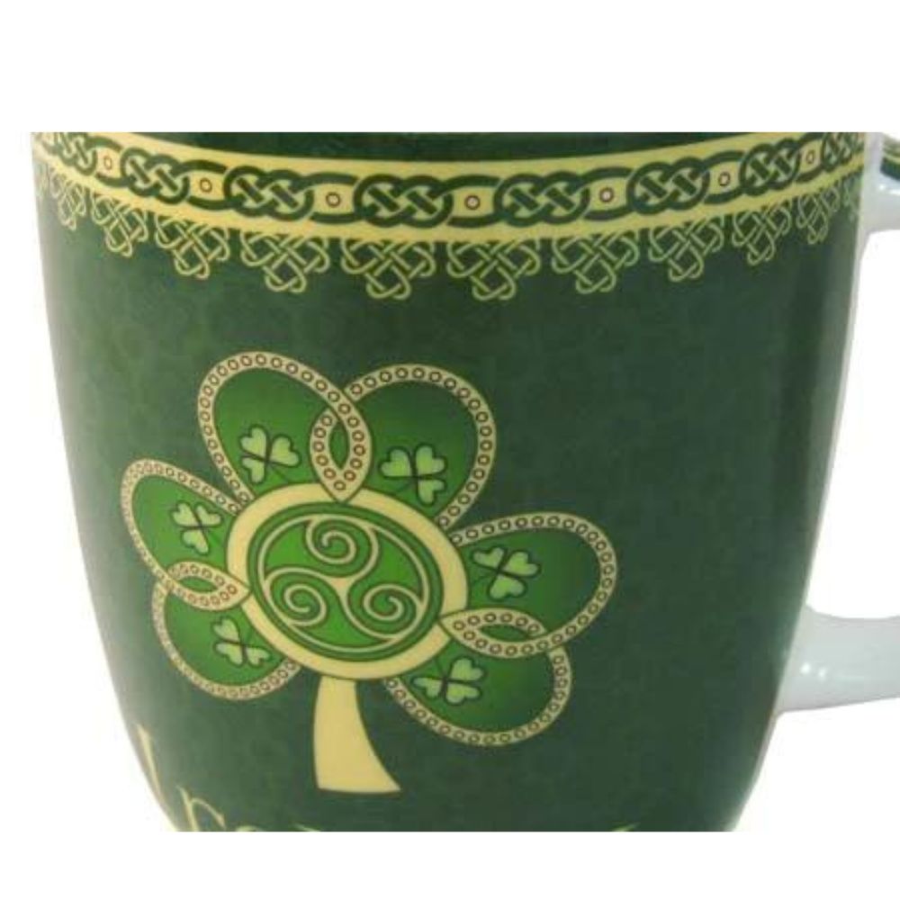 Shamrock Spiral Mug This new bone china mug with its highly ornate pattern features a golden shamrock with a triple spiral at its heart. It is bordered by never ending knot work symbolising eternity.