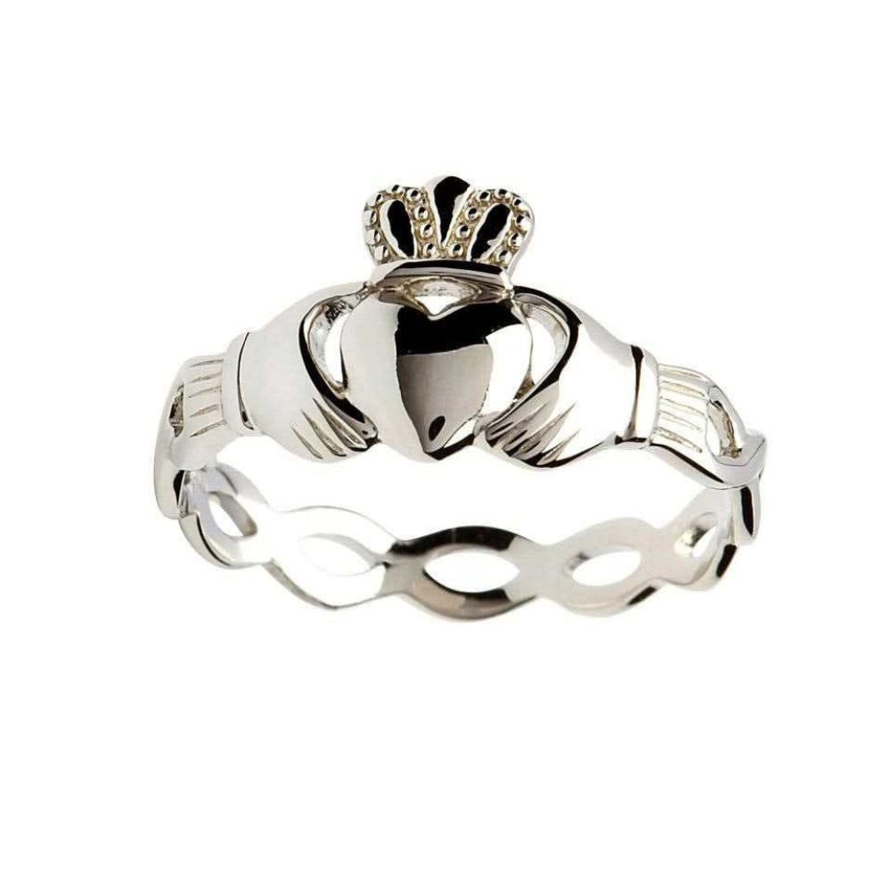 Symbolizing the essence of true love this sterling silver Claddagh ring is an exquisite piece of craft. The ring shines in sterling silver while it has an intertwining Celtic knot design that completes the design. The ring combines the concepts of Claddagh and Celtic knots into one symbolizing the endless nature of human spirit and love.