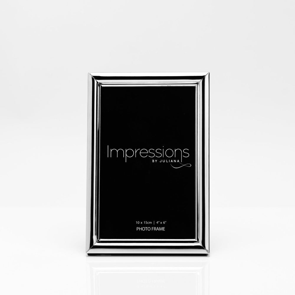 Impressions Silver-plated Photo Frame with Bevel Edge 4" x 6" Give a special photo the perfect place to shine with this elegant slim bevelled edge silver plated photo frame. From IMPRESSIONS - helping your photos speak their thousands words.