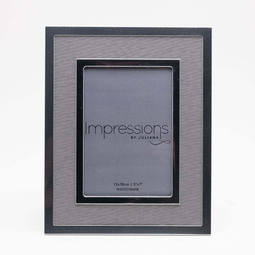 Silver Plated Photo Frame with Grey Linen Insert 5" x 7" Give a precious photo the perfect place to shine with this stylish silver plated photo frame with a grey linen insert. From Impressions - helping your precious picures speak their thousand words.