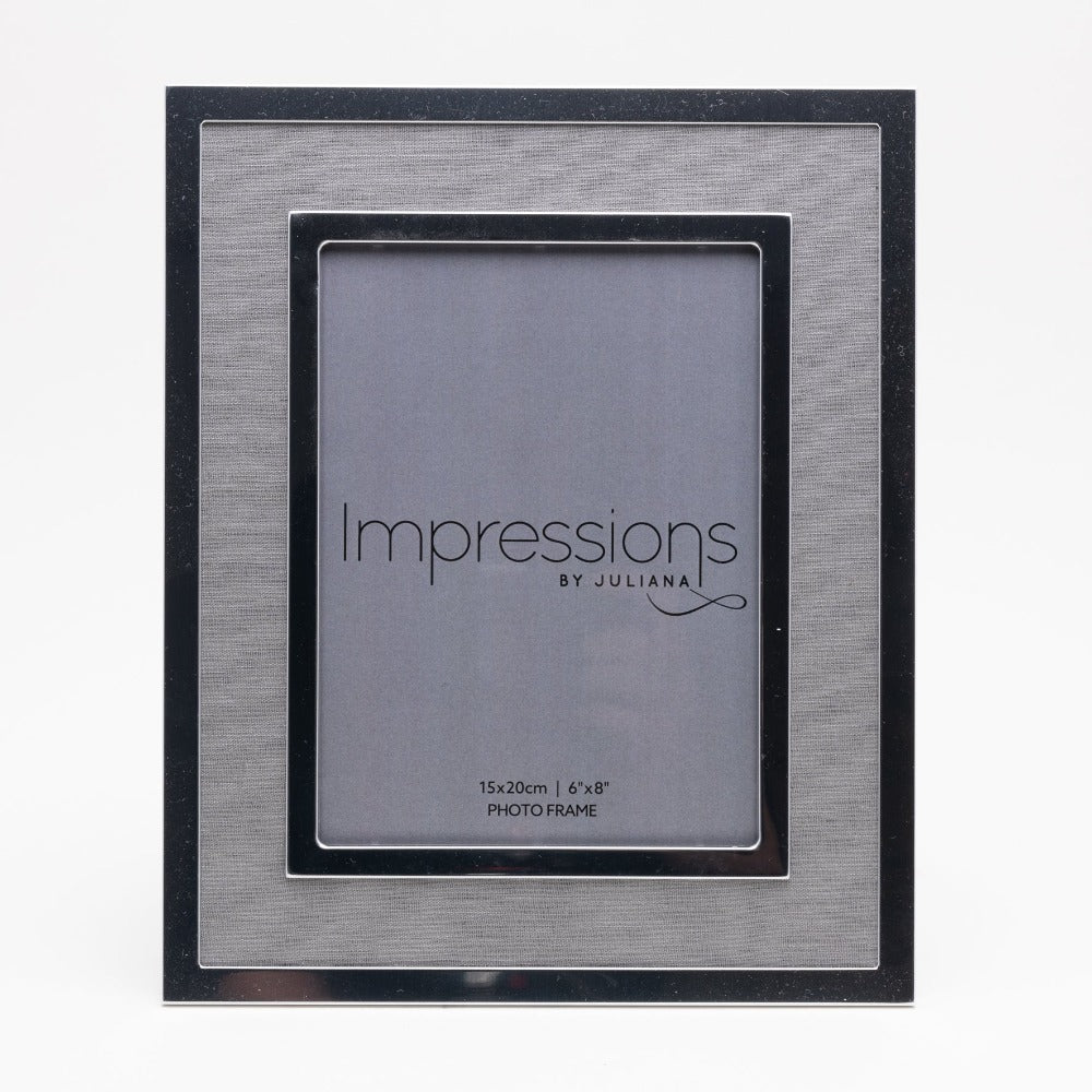 Silver Plated Photo Frame with Grey Linen Insert 6" x 8" Give a precious photo the perfect place to shine with this stylish silver plated photo frame with a grey linen insert. From Impressions - helping your precious picures speak their thousand words.