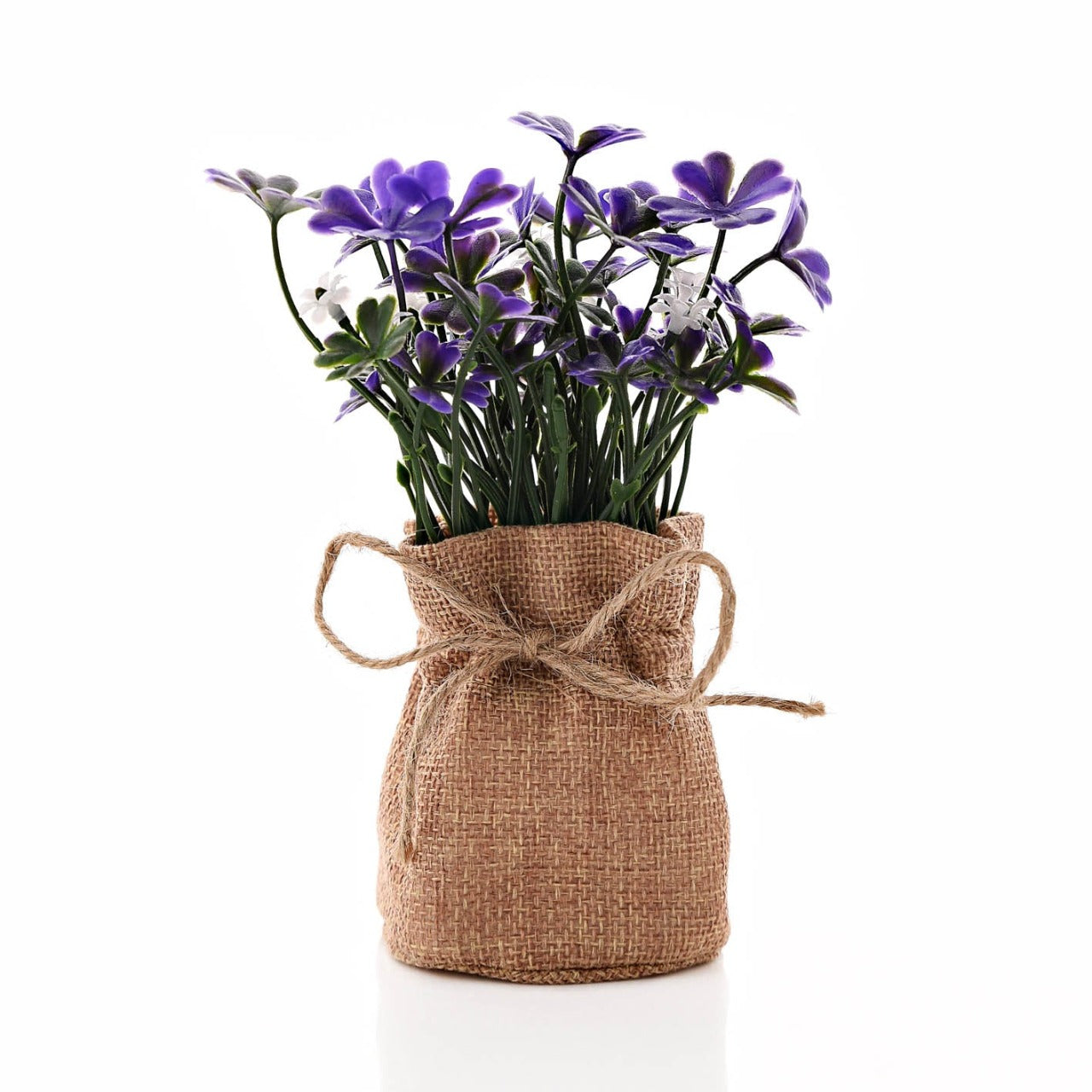 Small Purple Faux Plant In Hessian Bag 16 cm A wholesome, rustic, and vintage answer to house plants, this cute and stylish hessian bag features a 'love' print and a faux purple plant that will welcome some fresh colour into any living space this spring.