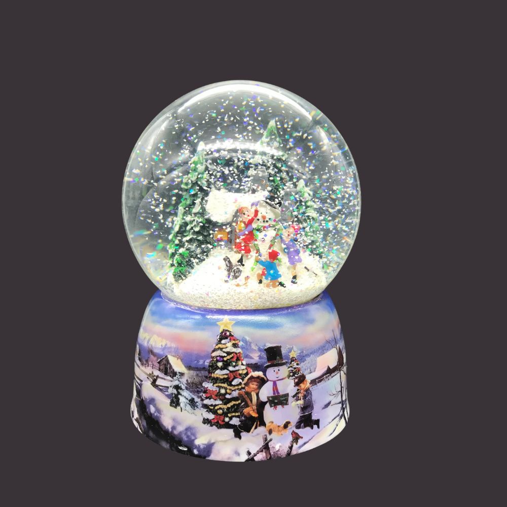 Snow Globe Children Building a Snowman Kids Building a snowman The whole globe rotates t the melody “Winter Wonderland”