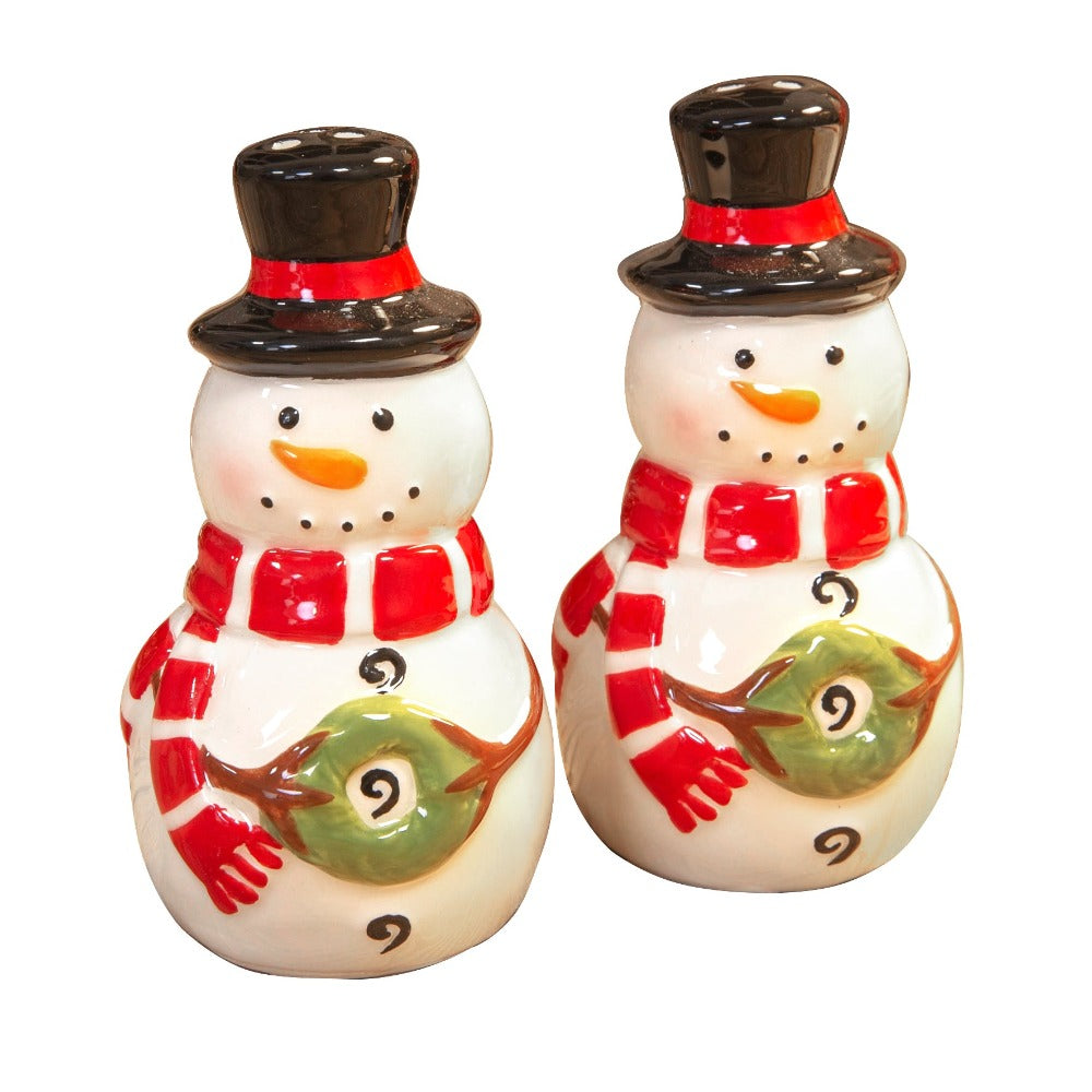 Christmas Festive Snowman Salt & Pepper Shakers Bring some extra festive cheer to the Christmas dinner table with these hand painted ceramic snowman salt & pepper shakers. From the North Pole Novelties Co. by Santa's Workshop - the one stop shop for Christmas cheer!