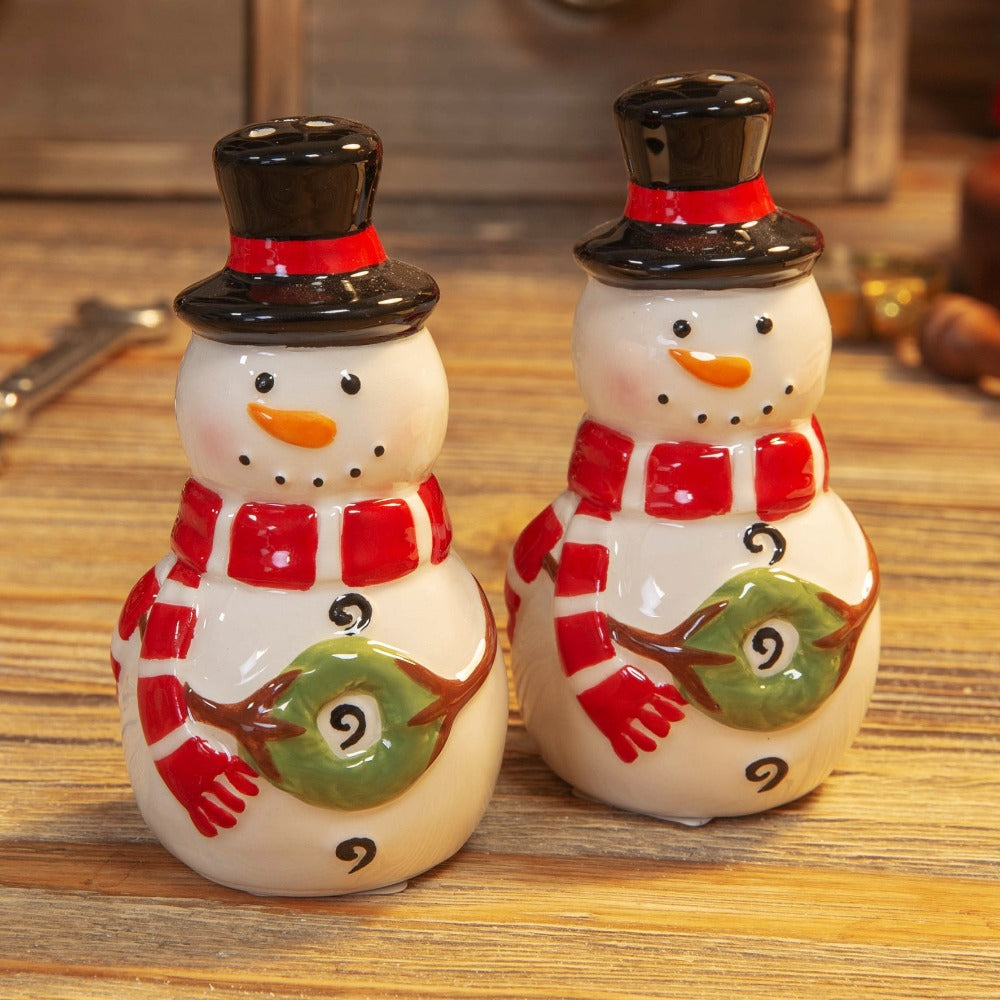 Christmas Festive Snowman Salt & Pepper Shakers Bring some extra festive cheer to the Christmas dinner table with these hand painted ceramic snowman salt & pepper shakers. From the North Pole Novelties Co. by Santa's Workshop - the one stop shop for Christmas cheer!