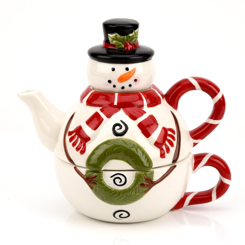 Snowman Teapot & Cup Give the tea lover in your life the perfect festive gift with this adorable earthenware snowman teapot and tea cup set. From the North Pole Novelties Co. by Santa's Workshop - the one stop shop for Christmas cheer!