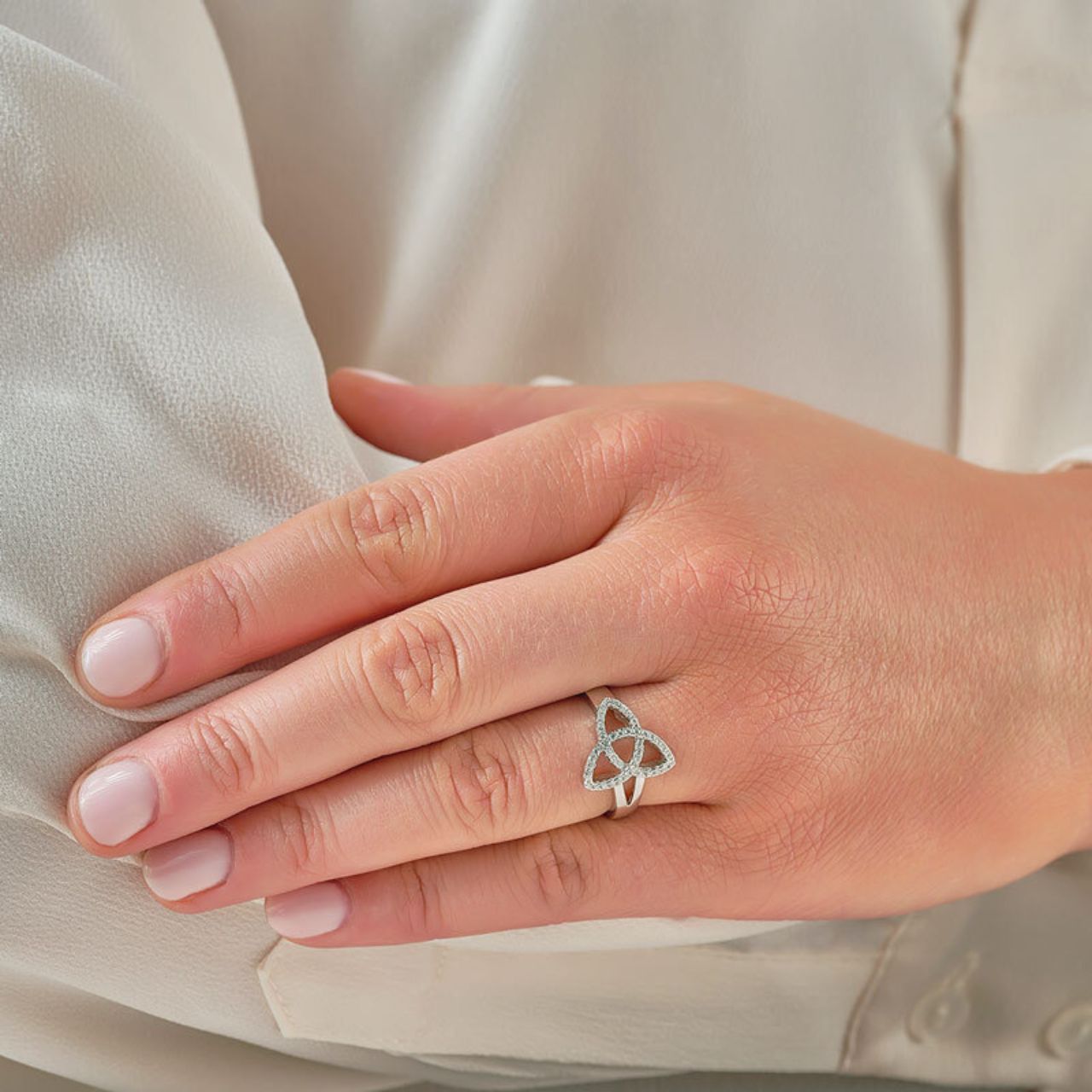 Solvar Silver Cubic Zirconia Trinity Knot Ring This sterling silver ring with cubic zirconia makes a real statement, and would make a fabulous gift for a loved one. The Trinity Knot has no beginning and no end, symbolising eternal life and everlasting love. It has been Irish hallmarked in Dublin Castle.