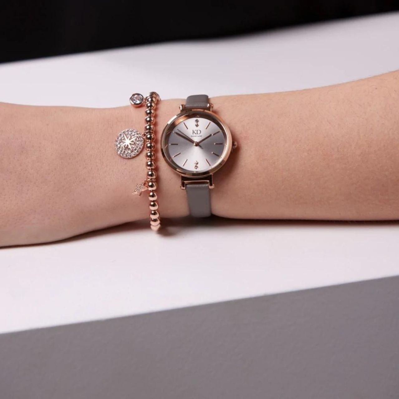 Knight & Day Star Beaded Bracelet Elegant beaded bracelet with star & crystal charms. Elasticated fit. Rose gold plating.