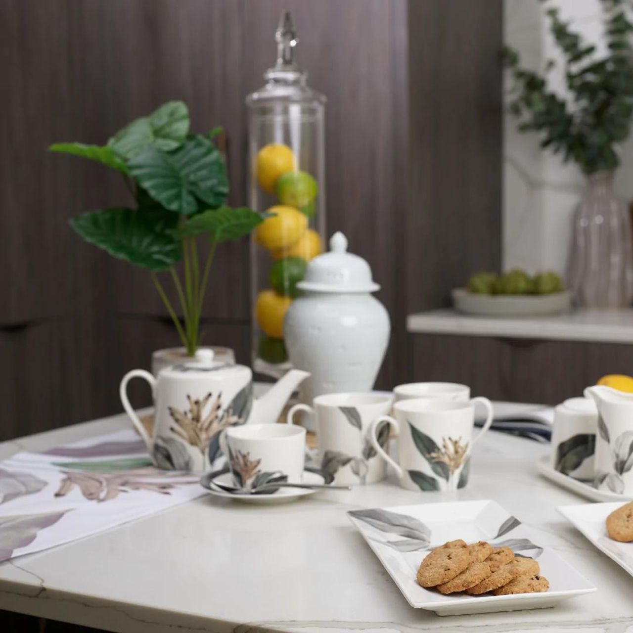 Birds of Paradise Sugar Bowl, Creamer and Serving Tray Set Latest addition to the Birds Of Paradise Tabletop Collection. A stunning Sugar Bowl, Milk Jug and Serving Tray Set. - Inspired with classic shades of green, gold & grey. - Ideal house warming gift, new home, birthday, or general occasion.