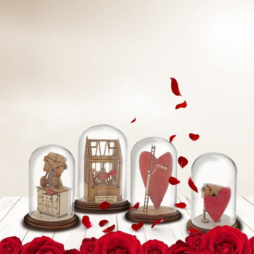 The Little Wooden Bear - I Love You Figurine The Little Wooden Bear. This little bear will make you smile, with sentiments to suit every occasion. This glass dome decoration encases our favourite little bear, adorned a giant red love heart, ready for the one he loves.