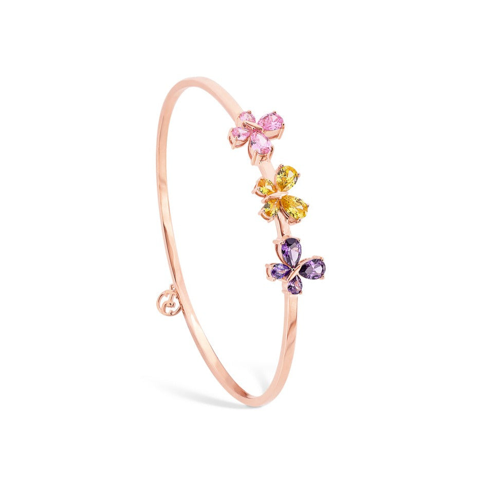 Tipperary Crystal Butterfly Bangle Pink Yellow Purple Drawing inspiration from urban garden, the Tipperary Crystal Butterfly collection transforms an icon into something modern and unexpected. Playful and elegant, this collection draws from the inherent beauty of the butterfly.