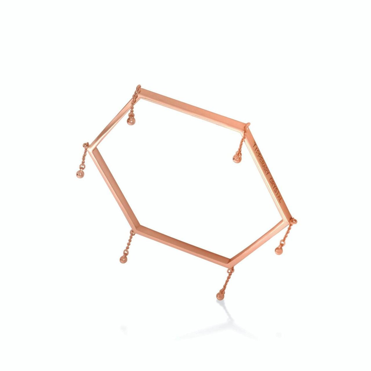 Tipperary Crystal Honeycomb Bangle Rose Gold Fashioned in rose gold this eye-catching hexagonal shaped bangle is adorned with shimmering cable chains at each point creating a really beautiful piece. This bangle can be worn alone or stacked with other arm pieces from this collection.
