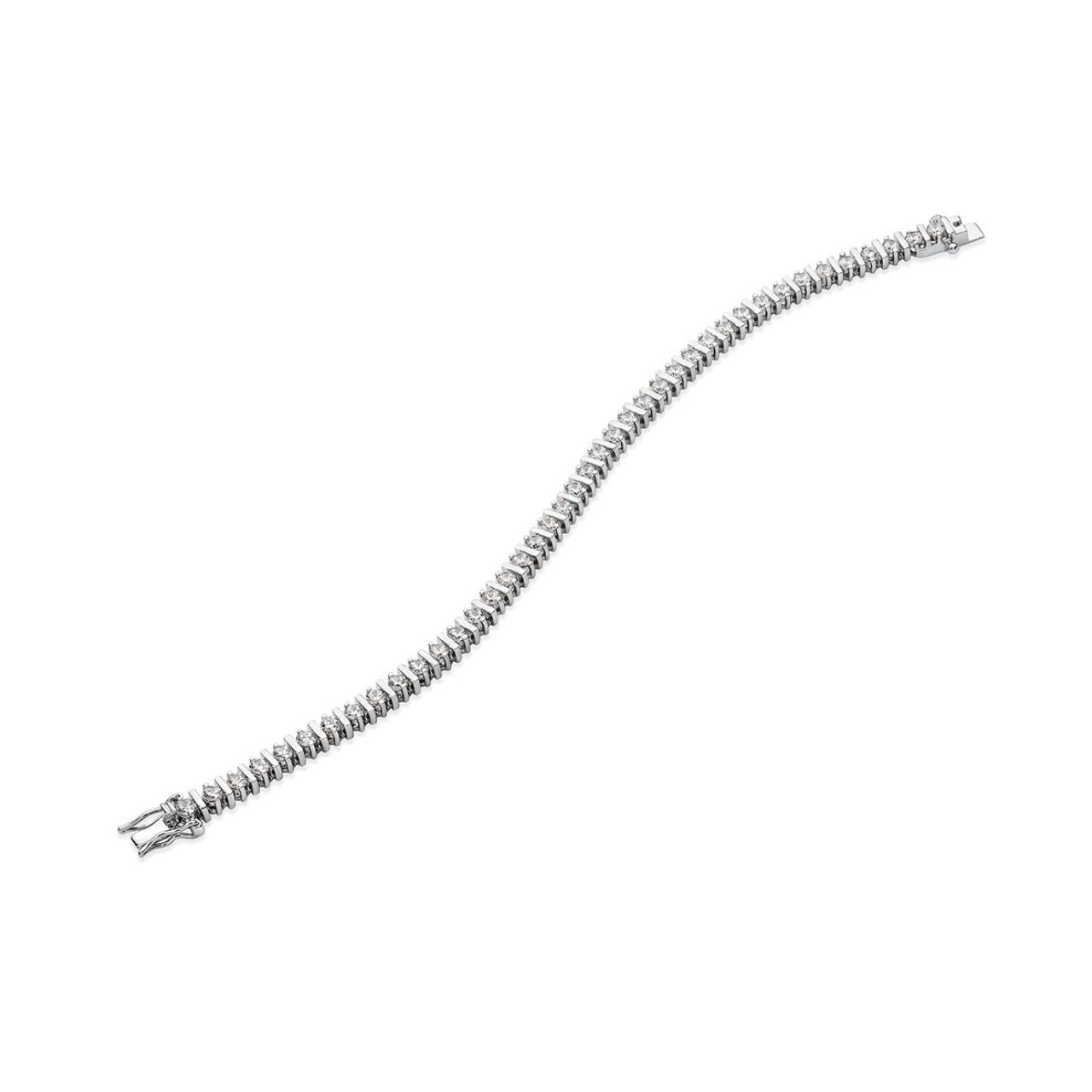 Tipperary Crystal Round Pillar Tennis Bracelet - Silver A stylish yet modern take on the traditional tennis bracelet. This simply chic style will add glamour to any look. Fashioned in sleek silver or warm rose gold, alternating two prong set crystals and smooth square links create an eye catching and unusual look perfect for any time wear.