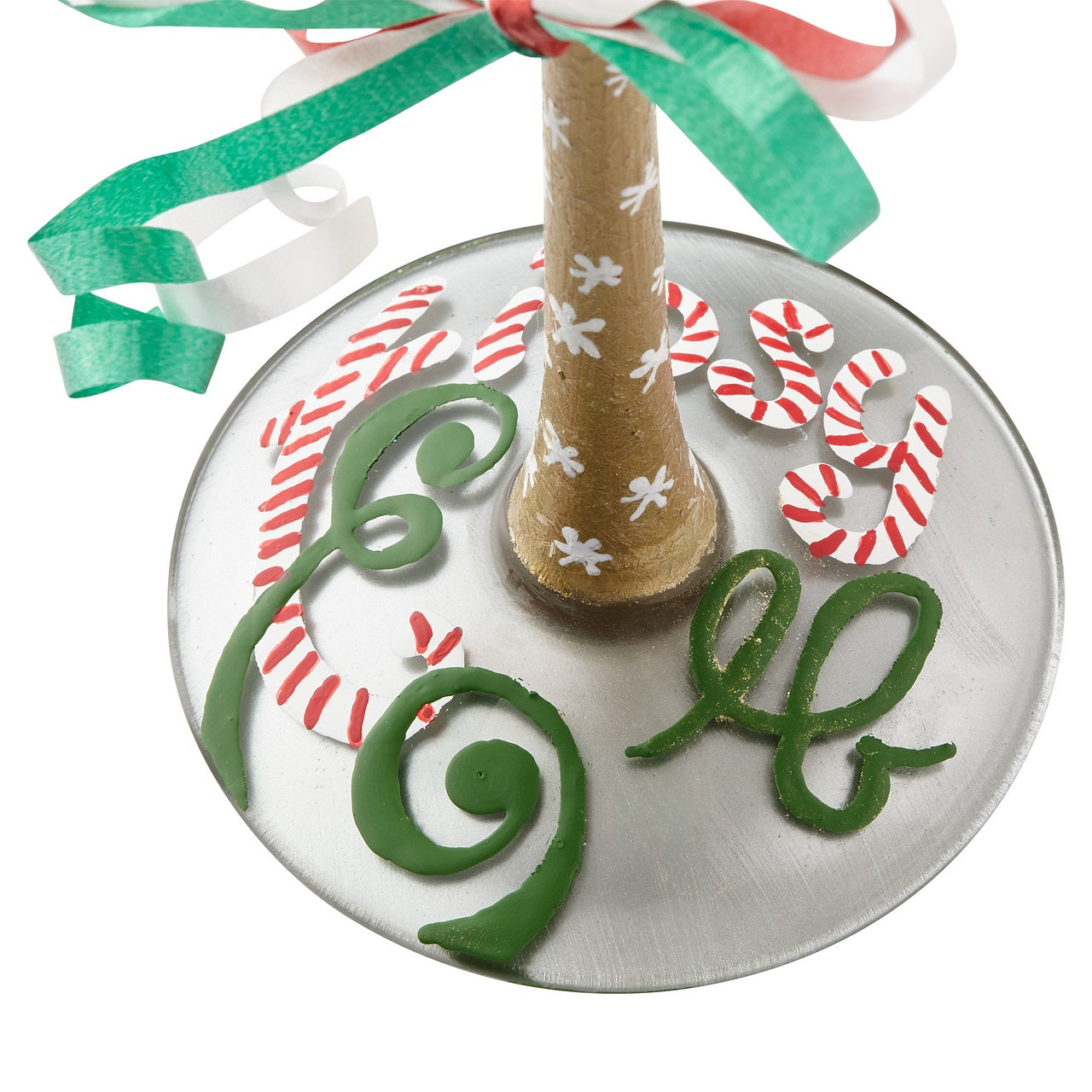 Tipsy Elf Wine Glass Gleeful and gulping, the little elves decking this glass are sure to delight and intoxicate your holiday. Arrives in a beautiful gift box with signature recipe. Artisan blown glass. Hand wash only.