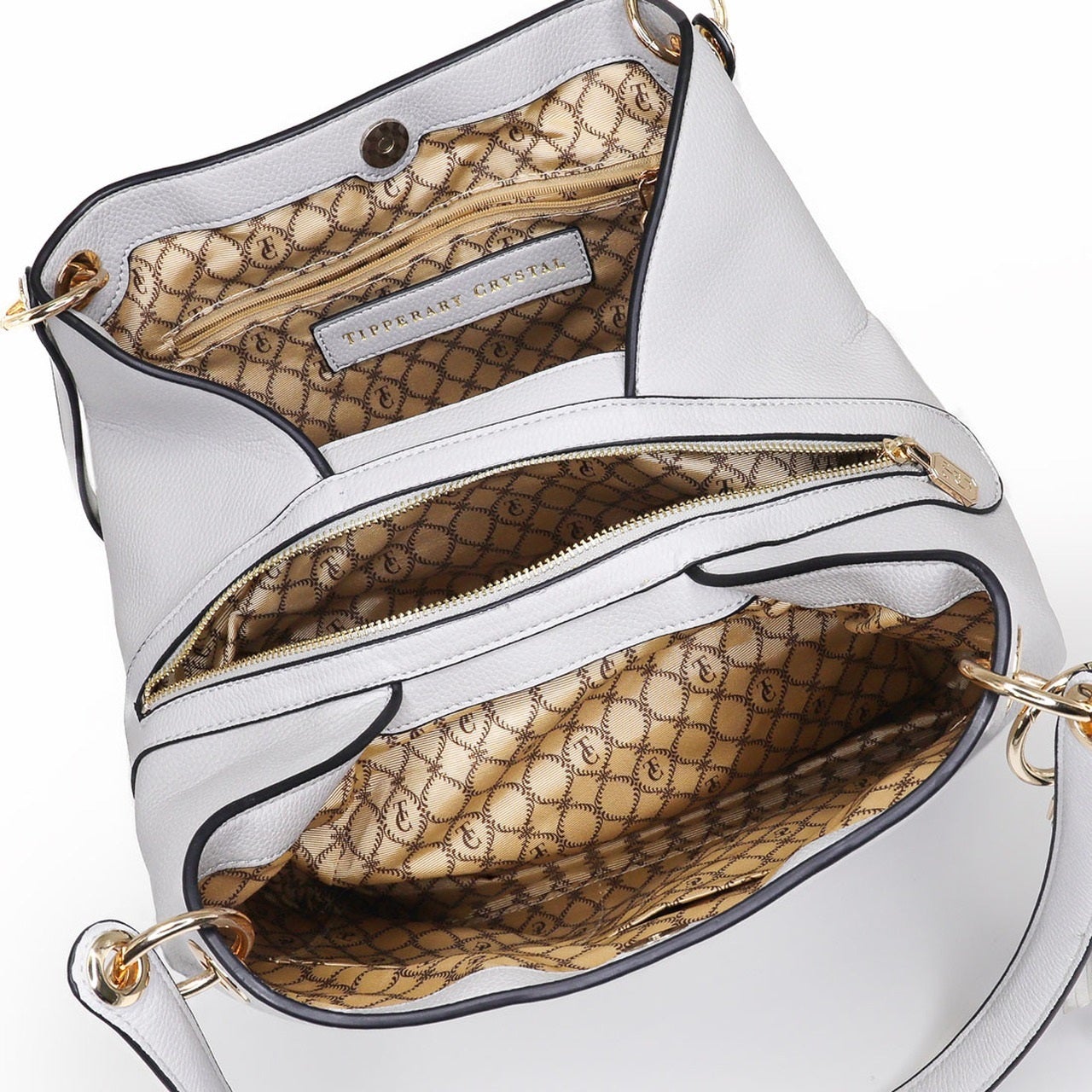 Tipperary Crystal Tote Bag - Sicily Grey (Yellow gold hardware) Our effortless Sicily Shoulder Bag is so comfortable you’ll want to carry it everywhere. This bag is crafted using soft pebbled leather look PU, the contrast of this with the metal hardware makes for a very attractive and practical bag.