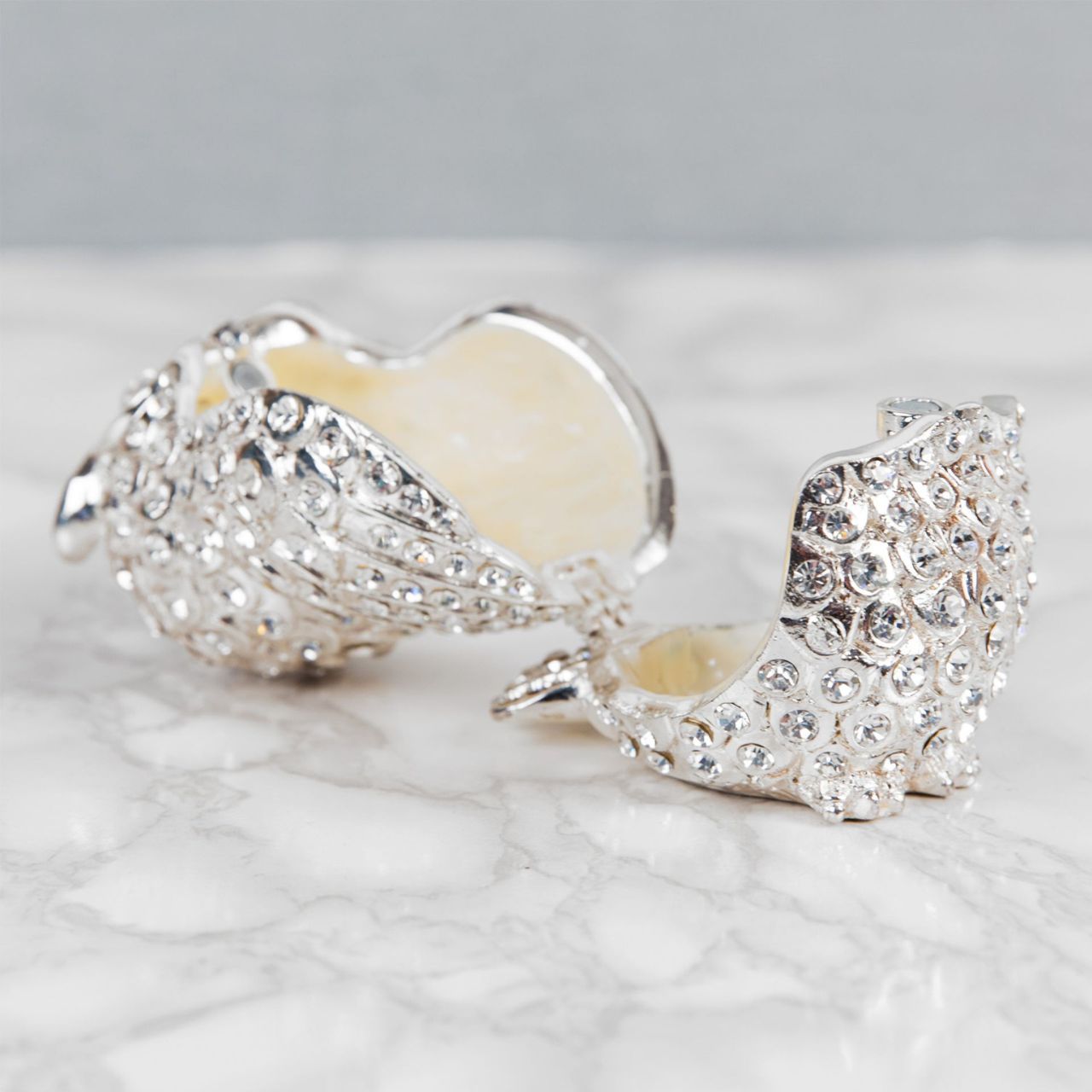 Treasured Trinkets - Crystal Owl A stunning crystal encrusted owl trinket box from Treasured Trinkets. This exquisite trinket box is a wonderful ornament to complement a mantelpiece, bookcase or cabinet.