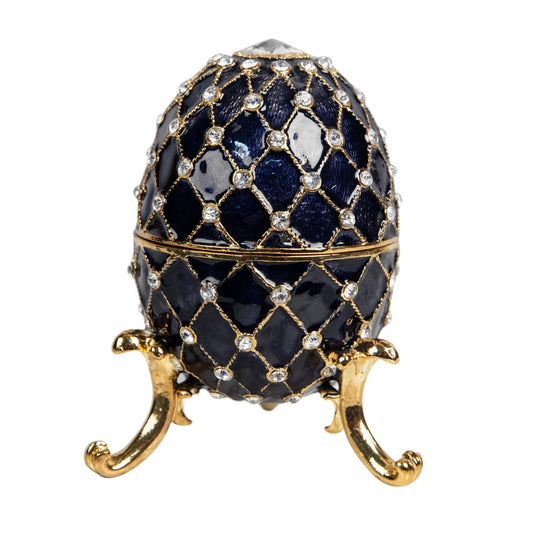 Treasured Trinkets - Large Fabergé Egg Blue  A beautiful, hand painted and crystal finished Fabergé egg trinket box from Treasured Trinkets.  Painted in a resplendent blue colour with stunning gold and crystal patterns, this trinket box is a wonderful ornament to complement a mantelpiece, bookcase or cabinet.