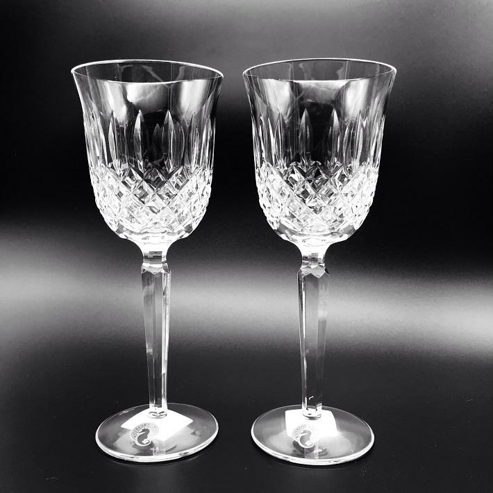 Waterford Crystal Kelsey Goblets Pair Kelsey Collection by Waterford is characterized by a simple demi-lune shape accented by an open diamond pattern and adorned with single wedge cuts.