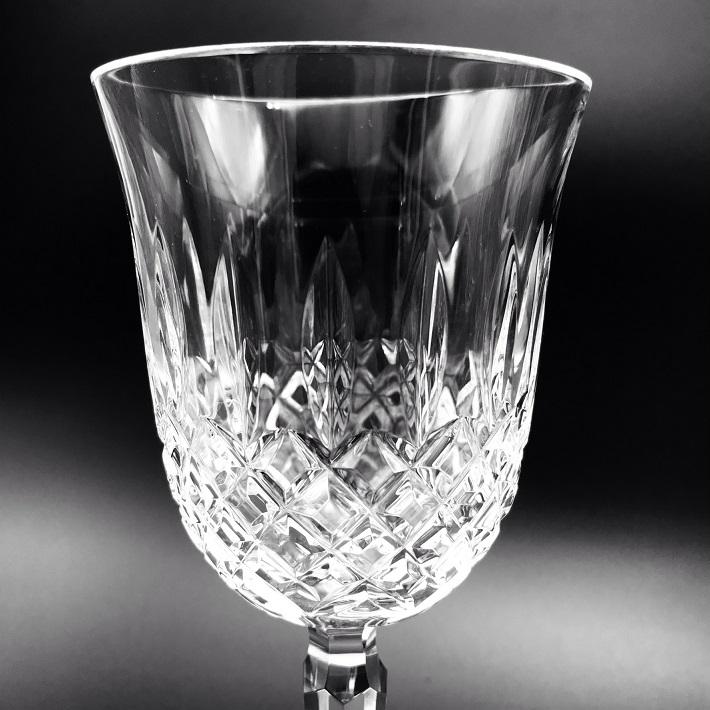 Waterford Crystal Kelsey Goblets Pair Kelsey Collection by Waterford is characterized by a simple demi-lune shape accented by an open diamond pattern and adorned with single wedge cuts.
