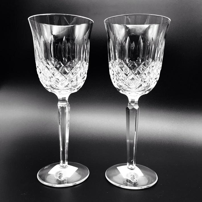 Waterford Crystal Kelsey Goblets Pair Kelsey Collection by Waterford is characterized by a simple demi-lune shape accented by an open diamond pattern and adorned with single wedge cuts.