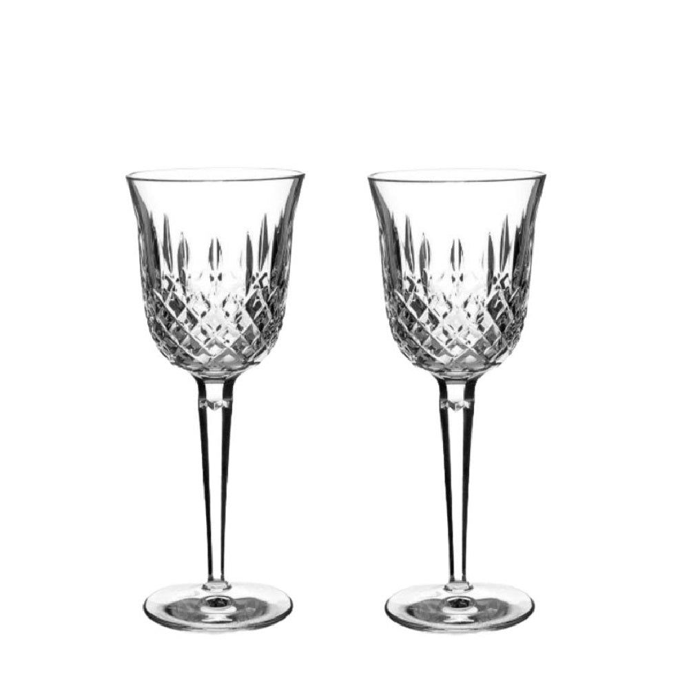 Waterford Crystal Kelsey Goblets Pair Kelsey Collection by Waterford is characterized by a simple demi-lune shape accented by an open diamond pattern and adorned with single wedge cuts.