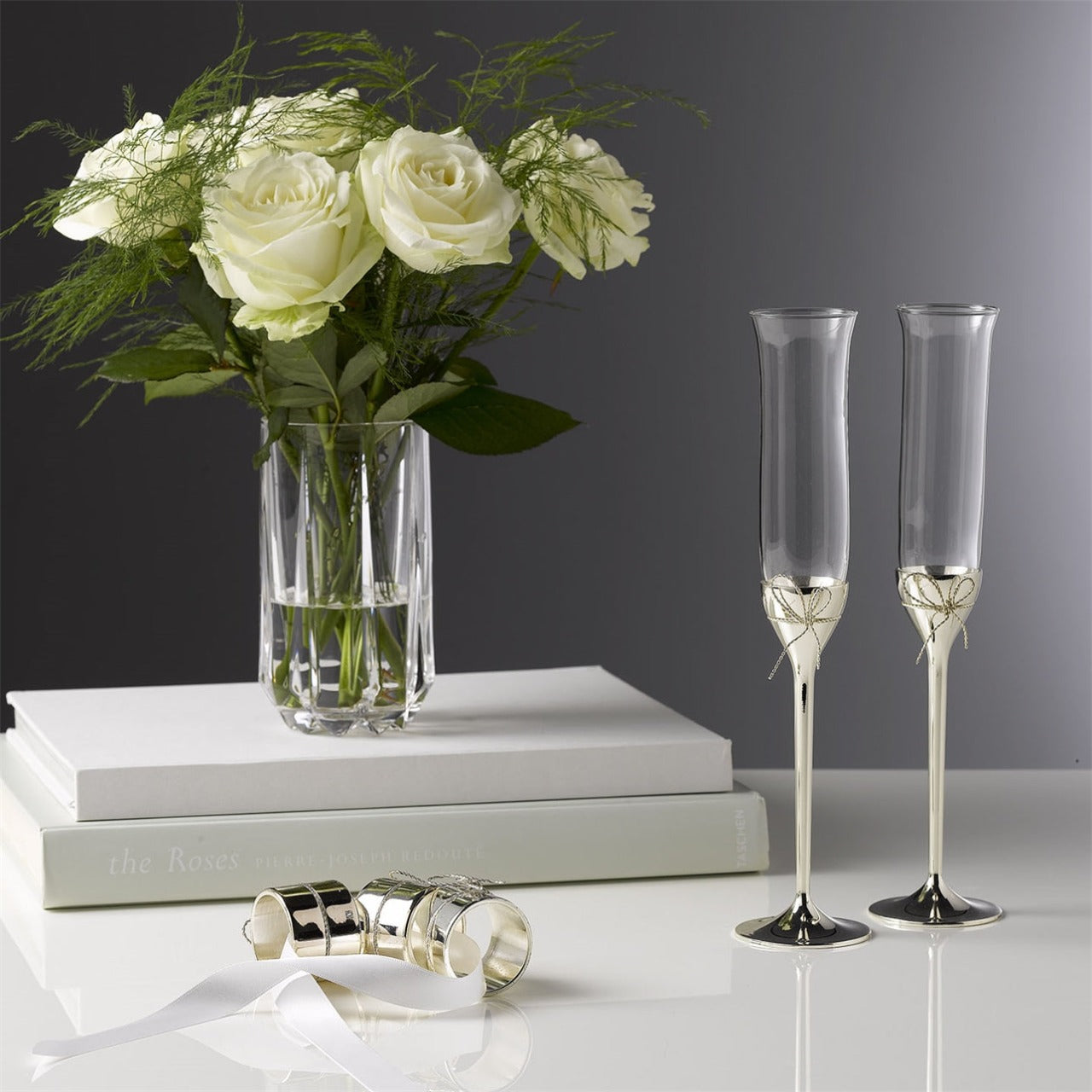 Wedgwood Vera Wang Love Knots Toasting Flutes Pair Raise a toast with these elegant Love Knots Toasting Flutes; perfect for champagne, spumante or sparkling wine.