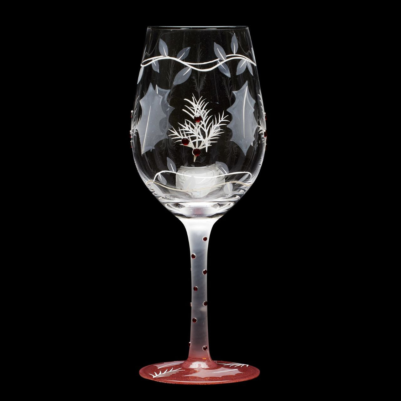 This lovely frosted wine glass enchants with a lightly painted winter forest scene. Encircled with vines and embossed holly leaves, this nature inspired cup enchants with inlaid red crystals and delicate stencilling. Have a Merry Berry Christmas.