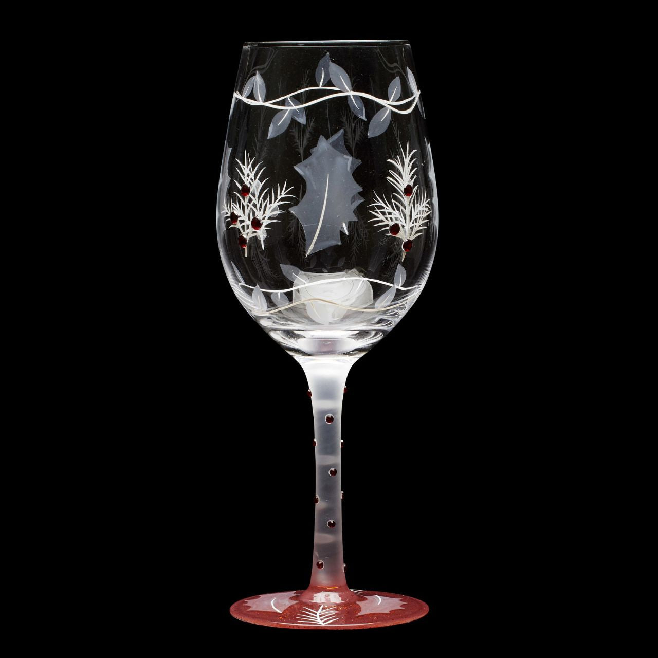 This lovely frosted wine glass enchants with a lightly painted winter forest scene. Encircled with vines and embossed holly leaves, this nature inspired cup enchants with inlaid red crystals and delicate stencilling. Have a Merry Berry Christmas.