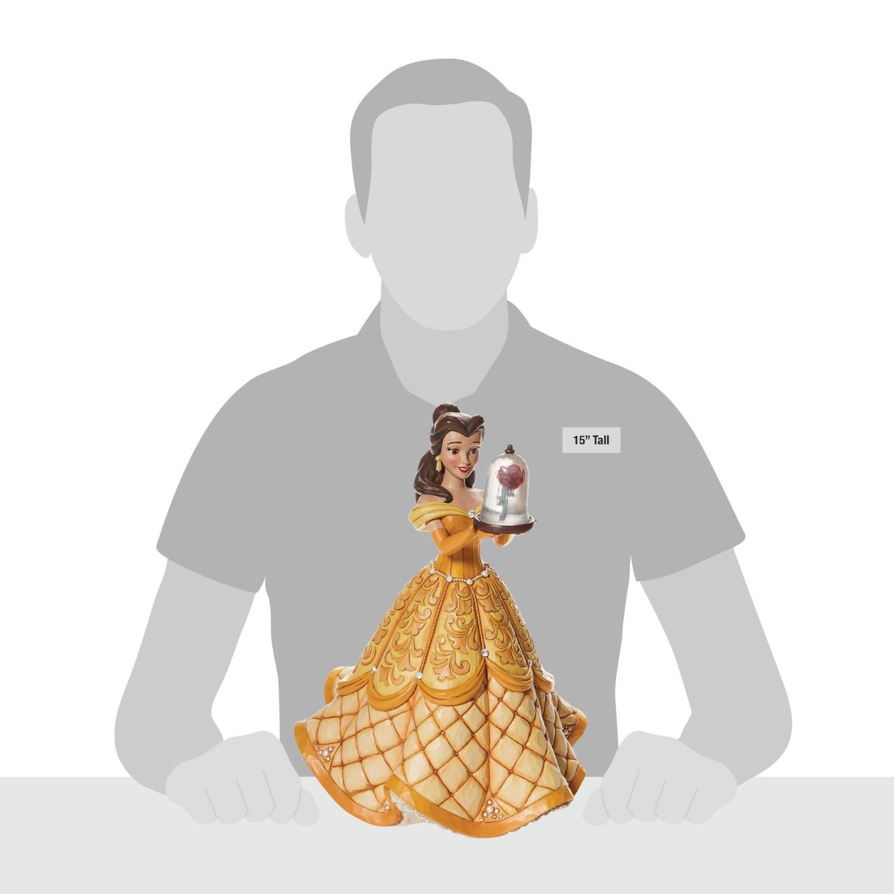 First in a Series of Deluxe figurines (The Enchanted Princess Series.) Designed by Jim Shore in celebration of Beauty and the Beast's 30th Anniversary is this striking 38.0cm Belle figurine, Belle looks stunning in her characteristic golden ball gown, embellished with pearls and swarovski crystals.