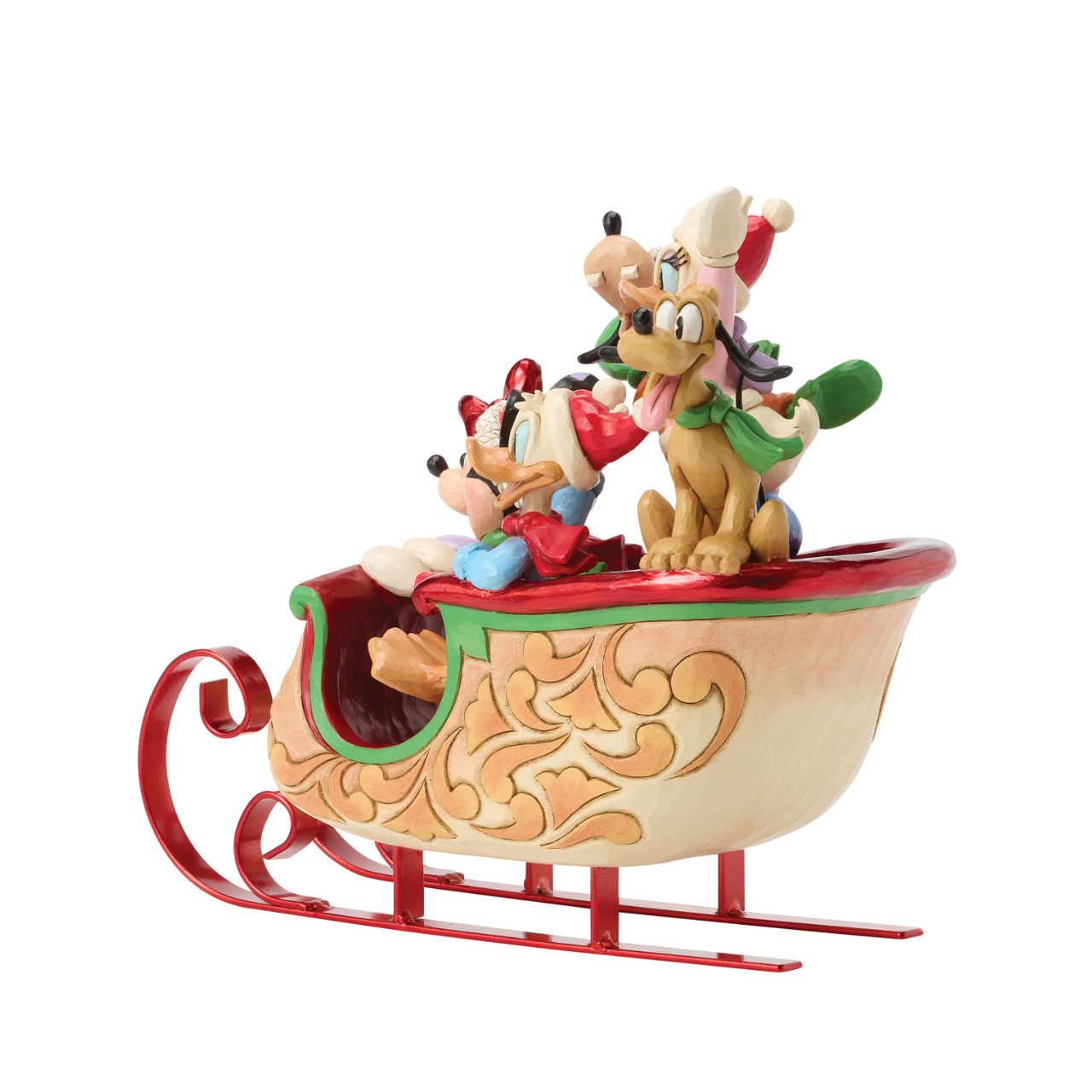 Celebrate the season with Jim Shore's enchanting Christmas sleigh ride featuring Mickey, Minnie, Donald, Daisy, Goofy, and Pluto bundled together in a beautifully crafted sleigh. Decorated with vibrant rosemaling patterns and gleaming metal runners.