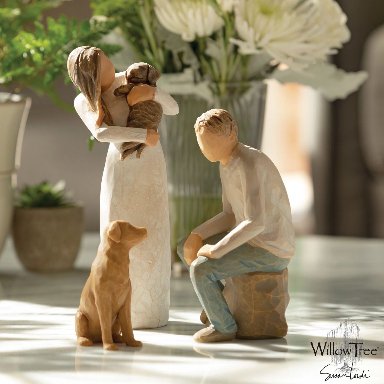Adorable You - Dark Dog by Willow Tree  Willow Tree is an intimate line of figurative sculptures representing sentiments of love, closeness, healing, courage, hope...all the emotions we encounter in life " When carving this figurine, I was influenced by the postures of classical sculptures, where the line of the shoulders is in opposition to the hips, or contrapposto.