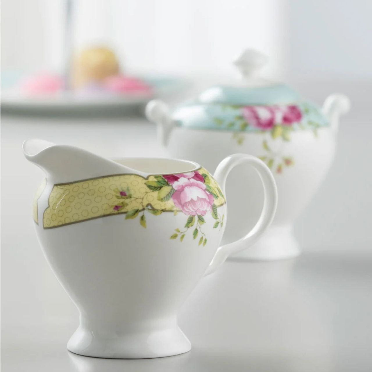Taking inspiration from the vast archive of artwork from Aynsley's over 240 year history, the pattern has been re-imagined with contemporary sensibilities. These Archive Rose Sugar and Cream Set are timeless and a classic addition to the Archive Rose Range.