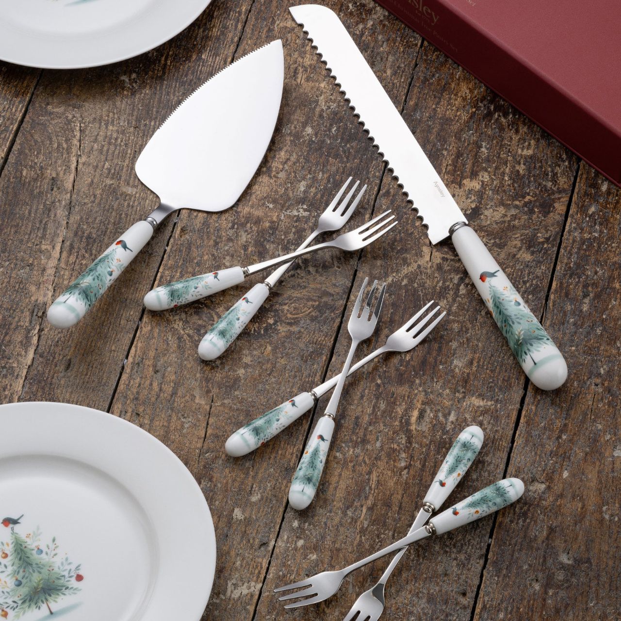 Perfect for festive gatherings, this pastry set showcases the enchanting Little Robin Christmas Tree design. A seasonal must-have for entertaining.