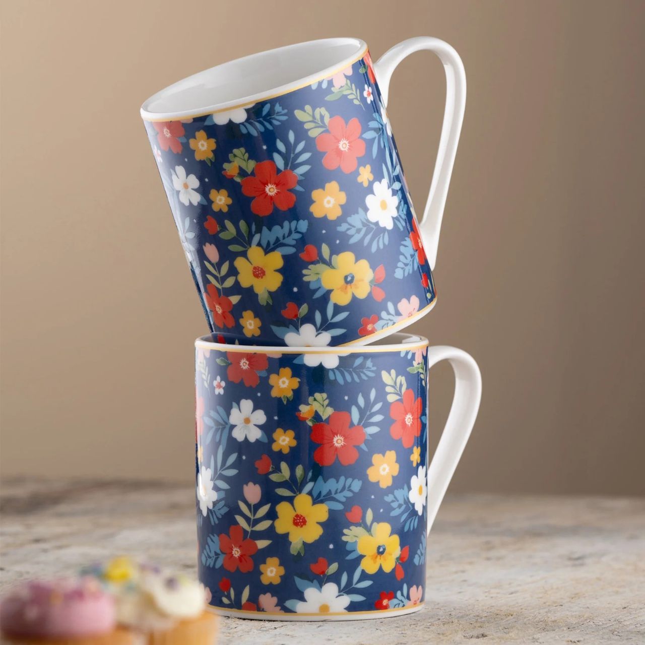 The Midnight Garden Mugs Pair brings sophistication to every sip with its rich, moody florals on fine china. Stylish and comfortable to hold, they come beautifully packaged, making them a perfect gift or a refined addition to your collection.