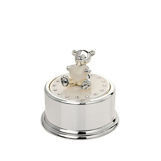 Crafted from high-quality silverplated metal, this music box boasts a lustrous, shiny finish that exudes sophistication and charm. At its heart, a lovable teddy bear embellishment sits atop the box, holding a pure white heart in its paws.