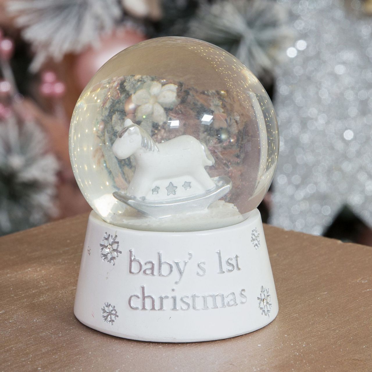 Snowglobe Bambino Baby's 1st Christmas  A Baby’s 1st Christmas water ball.  This smile-raising decoration is a lovingly designed decoration for celebrating the first Christmas of little ones.