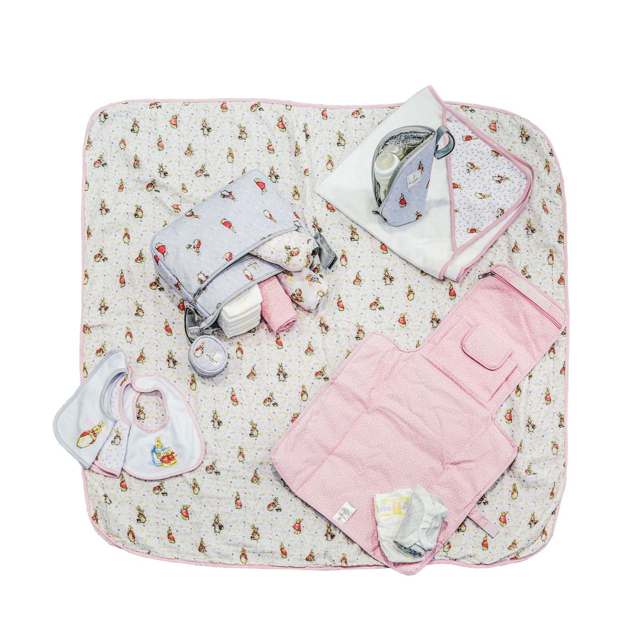 Beatrix Potter Peter Rabbit Baby Collection Changing Mat  This fold out Peter Rabbit changing mat is both adorable, practical and essential for quick trips out with your baby. The changing mat has been designed to take you seconds to unwrap and use when you are on the go, helping to spend more time on the things you love doing with your baby.