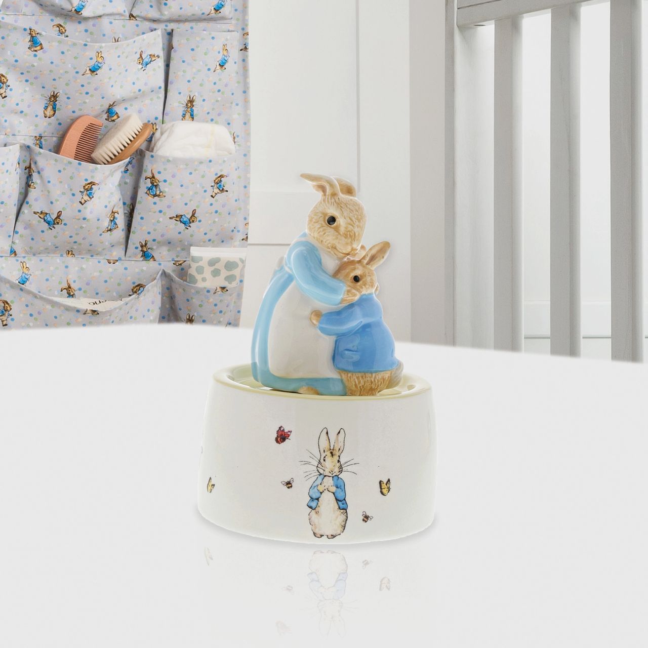 This charming and traditional Mrs. Rabbit and Peter Rabbit Musical makes a lovely traditional gift or nursery keepsake that children and parents alike will love and treasure forever. Wind up with the key and watch your favourite characters gently twirl around to the soothing sounds of Au Clair De La Lune.