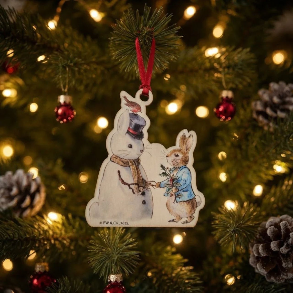 This Peter Rabbit and Snow Rabbit Wooden Hanging Ornament would make a truly unique gift or self-purchase.