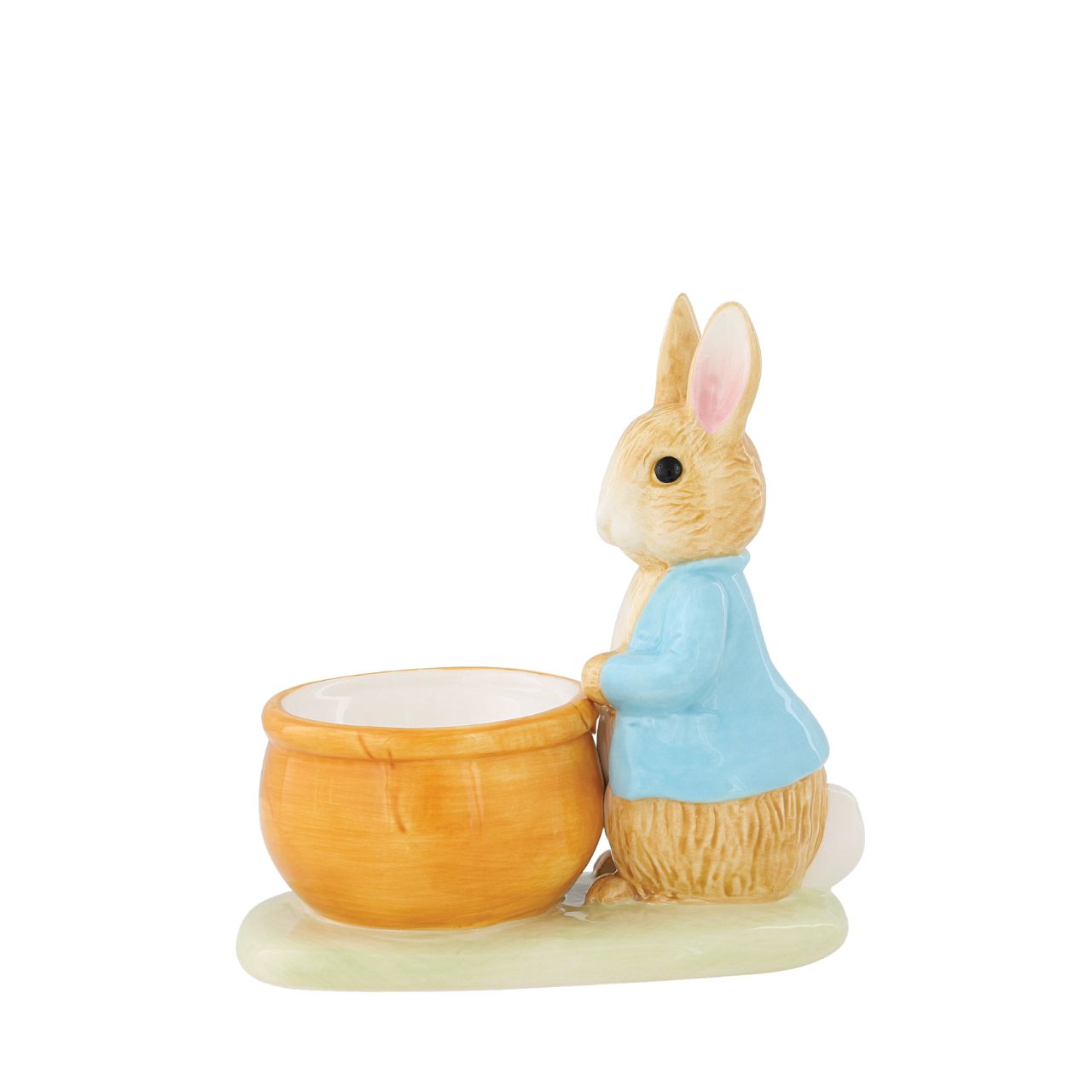 Peter Rabbit Egg Cup  Serve your morning eggs in style with our unique and charming Peter Rabbit egg cup, because regular egg cups aren't all they're cracked up to be...This beautiful Beatrix Potter egg cup has been made from sturdy ceramic and makes the ideal collector's piece or gift. We recommend you use large eggs to feel the true benefit, or why not fill with mini chocolate eggs for a sweet easter gift.