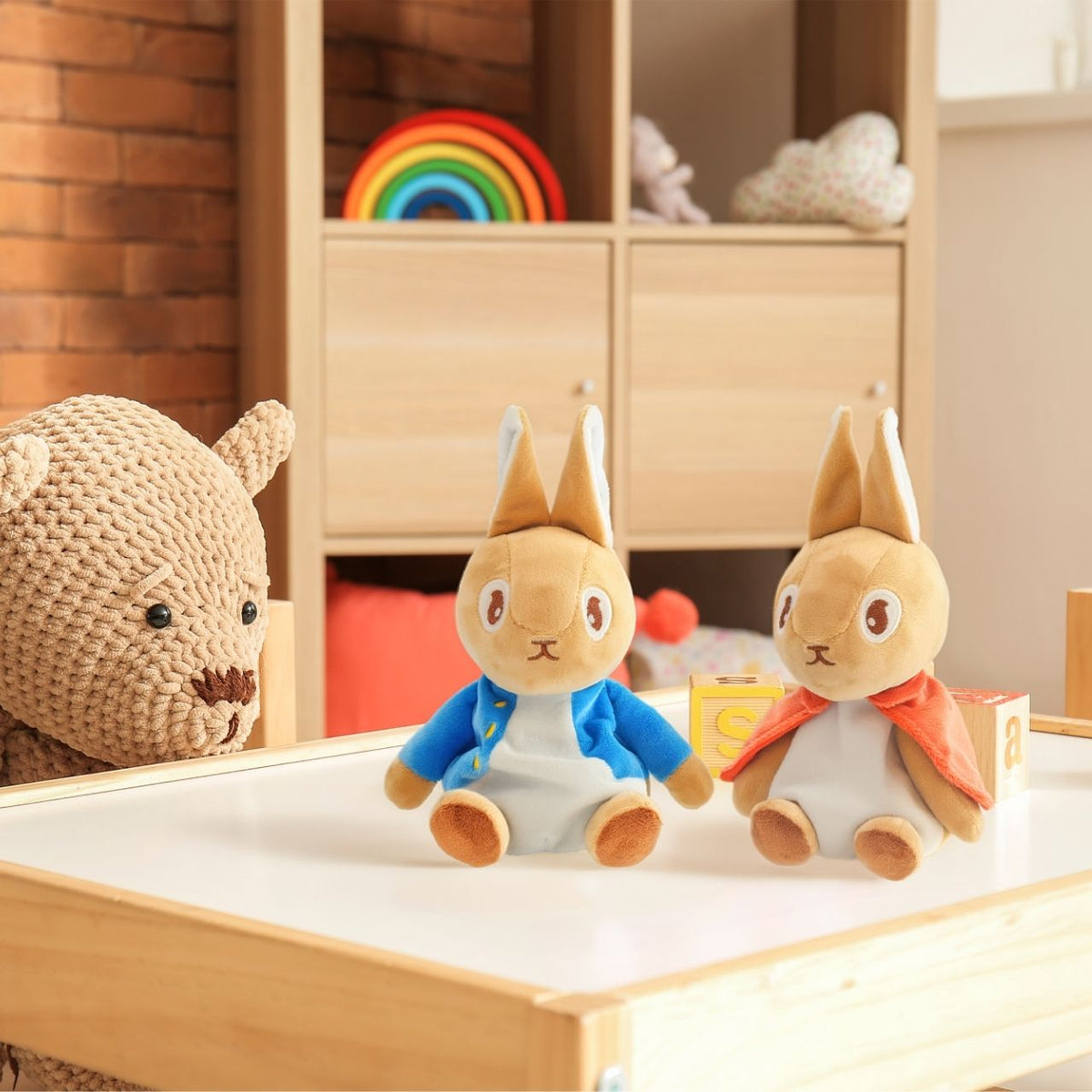 Peter Rabbit soft toy, designed with care and crafted with ultra soft premium materials. Its unique bean-filled bottom gives it a delightful weight, ensuring it sits perfectly on display.