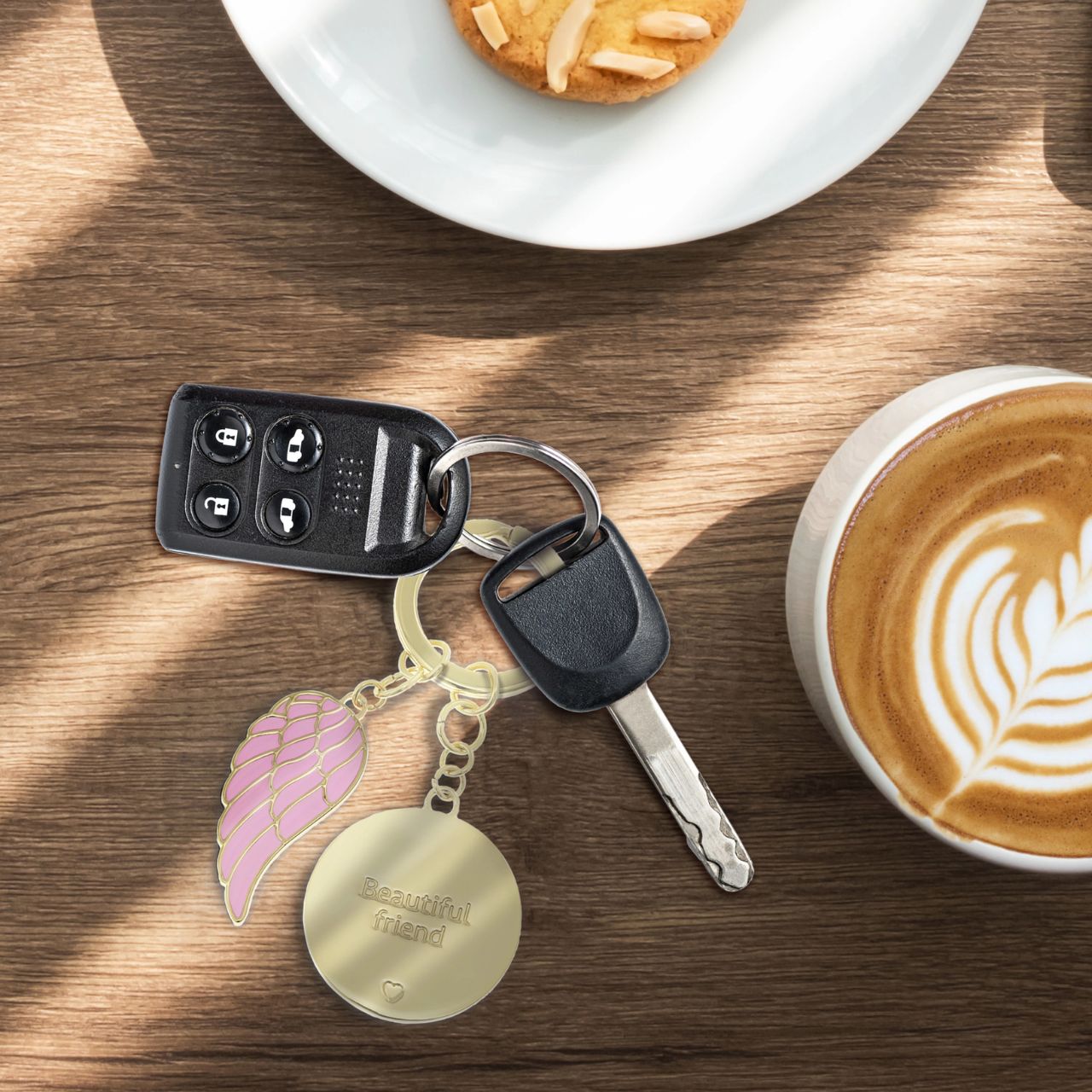 "Beautiful Friend" keychain: Crafted with luxurious leather and sleek metal, elegantly packaged in a gold embossed gift box. This sophisticated accessory symbolizes enduring bonds, a perfect gift celebrating cherished friendships in style.