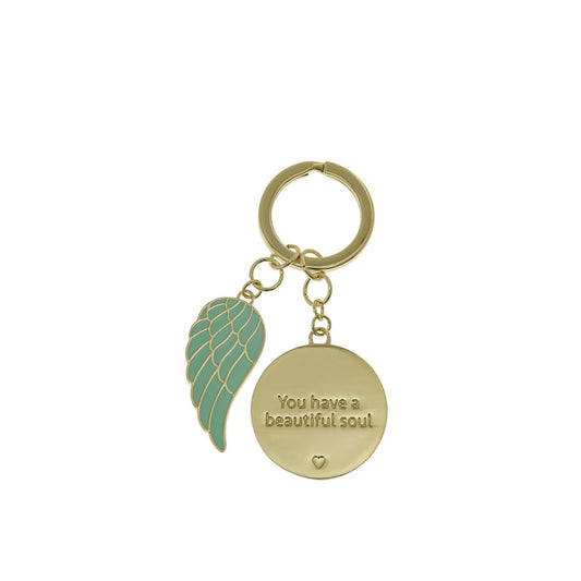 Introducing the 'Beautiful Soul' Key Chain by You are an Angel. An exquisite token gift nestled within a stunning gold embossed gift box. A timeless tribute celebrating inner beauty and kindness, a cherished keepsake to honour the profound depth of a special soul.