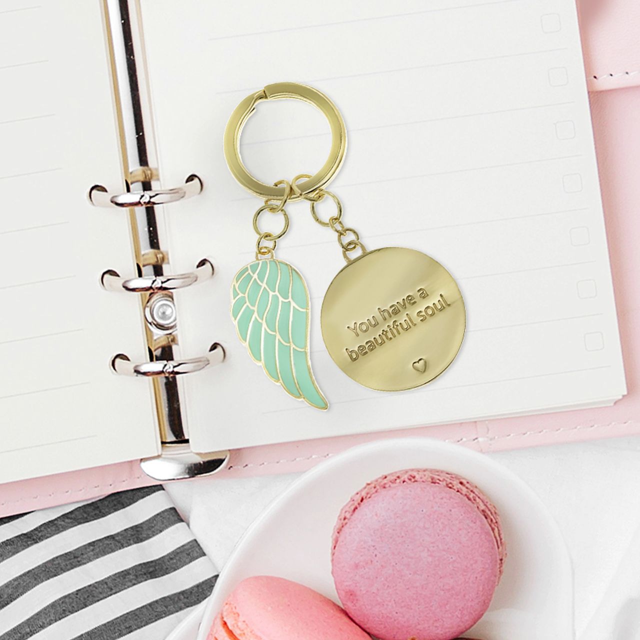 Introducing the 'Beautiful Soul' Key Chain by You are an Angel. An exquisite token gift nestled within a stunning gold embossed gift box. A timeless tribute celebrating inner beauty and kindness, a cherished keepsake to honour the profound depth of a special soul.